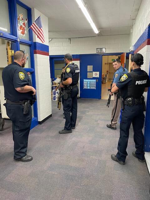 Officers training in the hallway