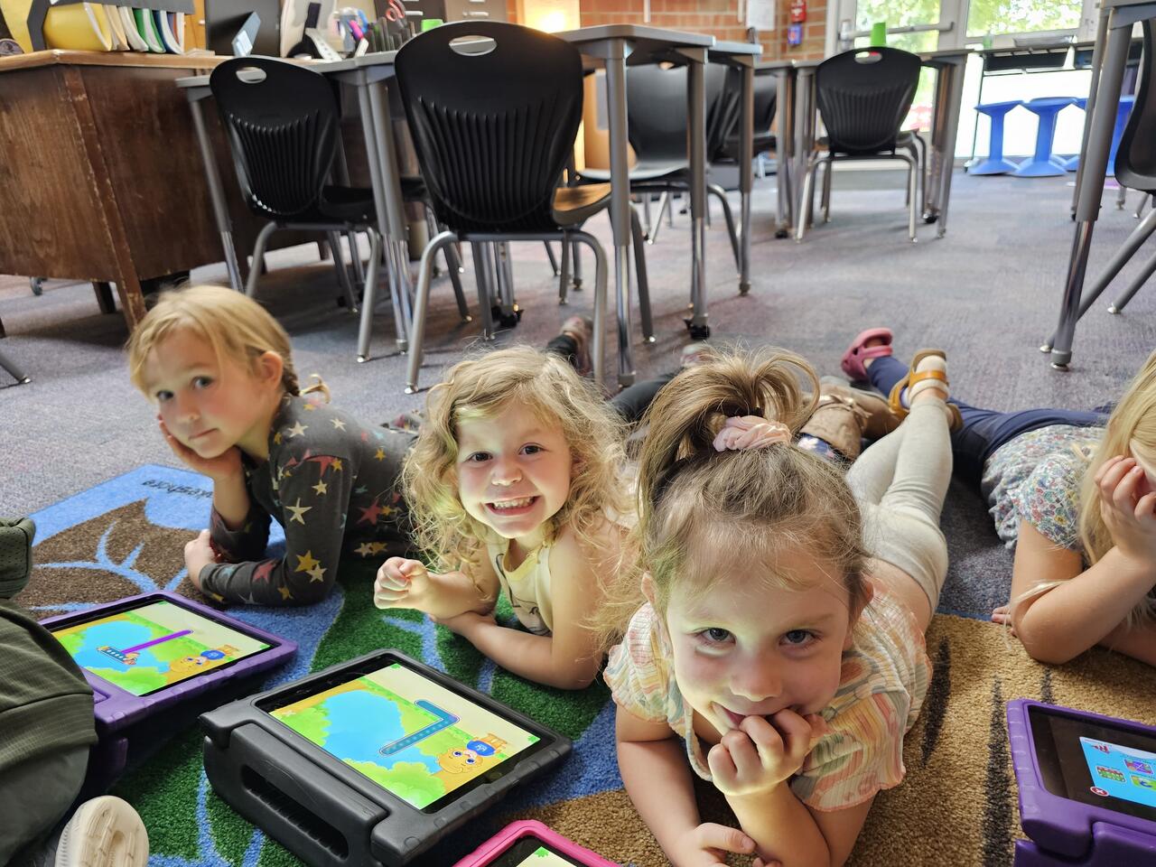 Preschoolers on their iPads in tech class
